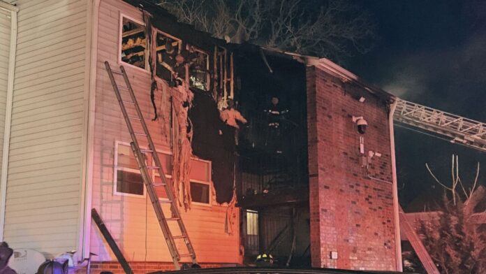 Kansas City firefighters rescue five trapped in apartment fire
