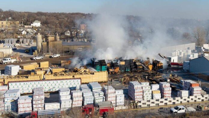 Massive lumberyard fire near downtown Kansas City sends flames skyward