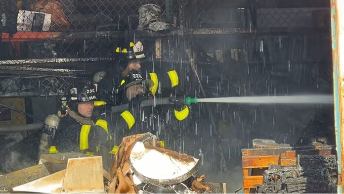 FDNY battles four-alarm warehouse fire in Red Hook Brooklyn