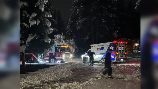 Firefighters shovel snow-covered driveway to help elderly couple in Spokane County