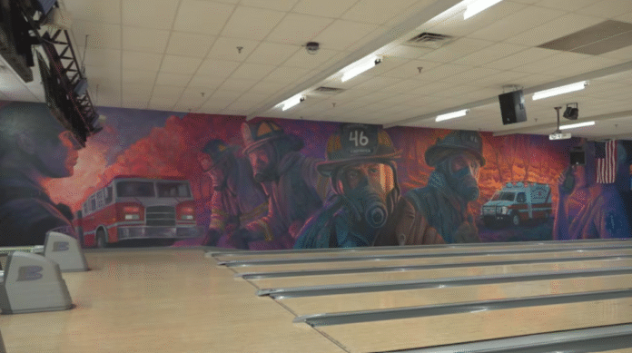 Artist paints mural in West Virginia to honor firefighters who responded to 2024 wildfires