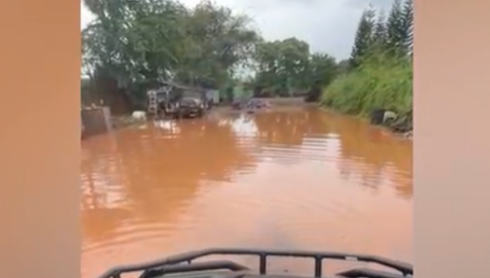 Farmer, a former firefighter, rescues co-worker from flood in Waialua