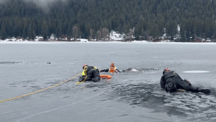 King County Dive team rescues man who fell through the ice in front of them