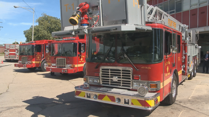 Police, firefighters rescue three people from a house fire in Flint