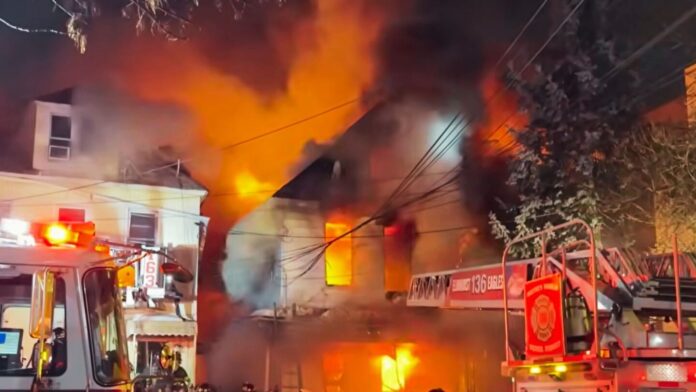 Queens house fire in Elmhurst kills woman, injures 10, including child