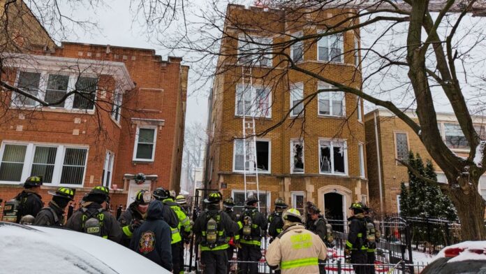 Chicago firefighter critically burned in floor collapse during North Side apartment fire