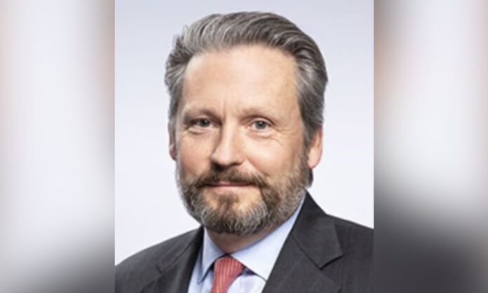 Crawford appoints W. Bruce Swain CEO