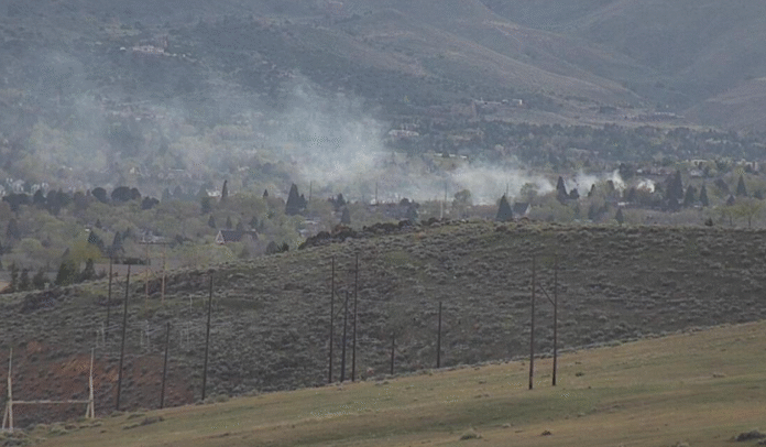 Fire burns half an acre near Interstate 80 in west Reno