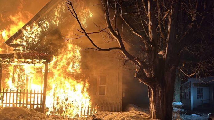 Firefighter falls through the floor of a home while battling fire overnight in Whitefield