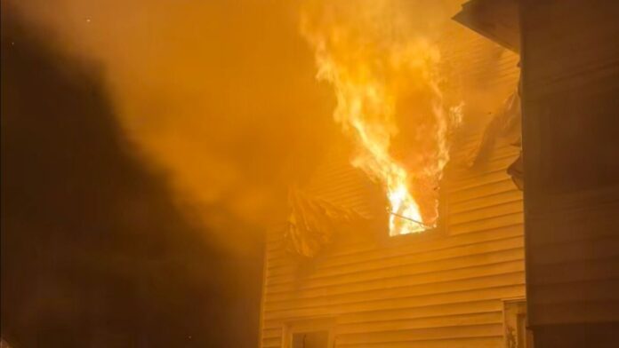 Firefighters rescued after being trapped in Muskegon Heights house fire