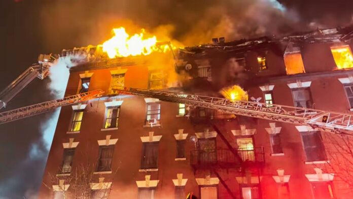 Five-alarm Bronx apartment fire spreads to cockloft, kills man