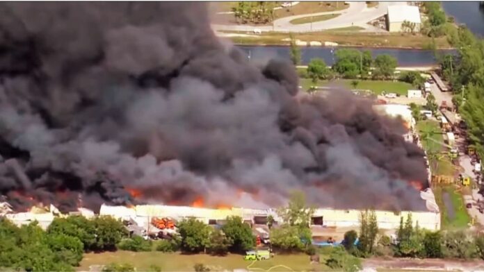 Four-alarm warehouse fire near Miami Gardens draws massive response