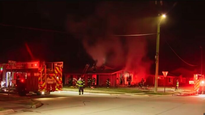 Livonia firefighter falls through floor into basement during house fire