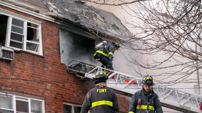 Queens fire kills four, including child, after flames rip through Flushing building