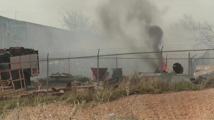 Wind-driven wildfire spreads into Oklahoma City auto body shop, officials say