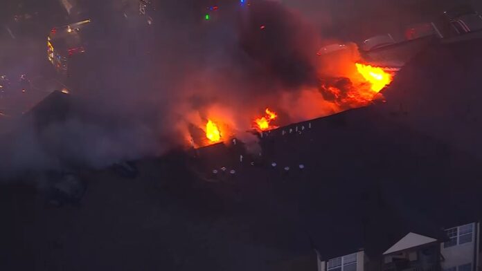 Fire tears through apartment complex in Woodbridge
