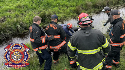 Firefighters work together to rescue stuck horse from creek in Roy