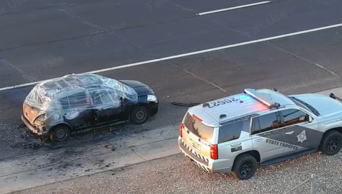 Woman arrested after body found in burning vehicle on Loop 101 in Glendale