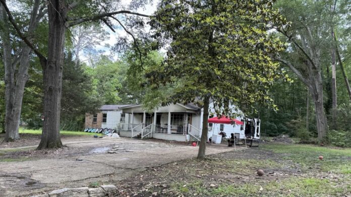 Jackson fire department investigate house fire on Iris Avenue