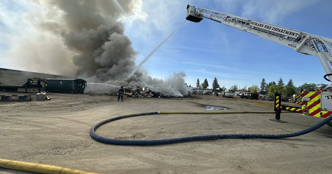 Pile of scrap metal catches fire on North Perry Street in Spokane